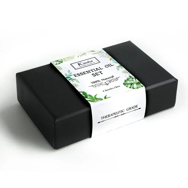 Essential Oils Set (6 x 10ml) with therapeutic-grade natural scents in black packaging.