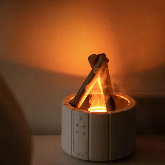 Bonfire Diffuser emitting warm light with campfire design.